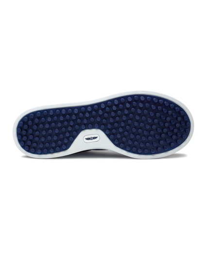Straight Down Boardwalk Golf Shoe in Petrol, bottom sole view featuring solid navy circular traction nub outsole with white arch bridge and navy Straight Down wing logo badge at center