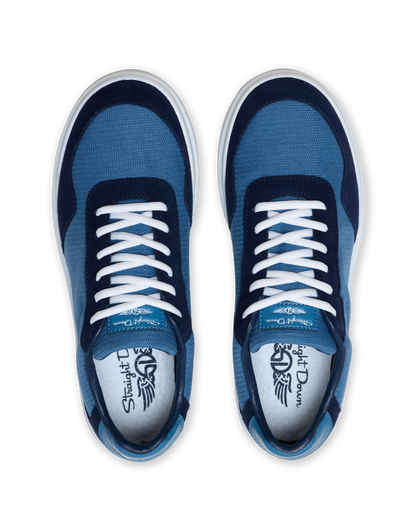 Straight Down Boardwalk Golf Shoe in Petrol, top-down view of pair featuring medium blue canvas upper, navy suede overlays, white laces, and light blue Straight Down wing logo insole