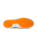 Straight Down Boardwalk Golf Shoe in Stone, bottom sole view featuring solid orange circular traction nub outsole with white arch bridge and orange Straight Down wing logo badge at center