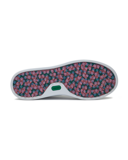Straight Down Boardwalk Golf Shoe in Verde, bottom sole view featuring floral hibiscus print outsole with circular traction nubs in pink and blue tones and green Straight Down logo badge at arch