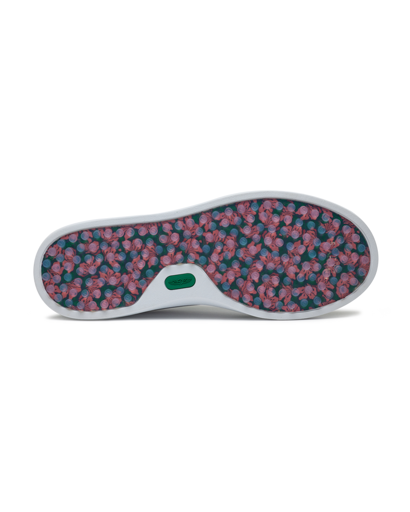 Straight Down Boardwalk Golf Shoe in Verde, bottom sole view featuring floral hibiscus print outsole with circular traction nubs in pink and blue tones and green Straight Down logo badge at arch