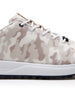 Straight Down Defender Golf Shoe in Camo Stone, close-up lateral side detail view featuring cream and tan desert camouflage print upper, navy lace eyelet accents, white laces, and navy traction outsole