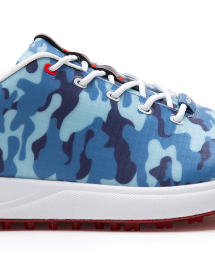 Straight Down Defender Golf Shoe in Camo Ocean, close-up lateral side detail view featuring blue tonal camouflage print upper, red lace eyelet accents, white laces, white midsole, and red traction outsole