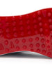 Straight Down Defender Golf Shoe in Camo Ocean, close-up outsole detail view featuring solid red mixed traction outsole with hexagonal and triangular lug pattern and white midsole edge