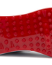 Straight Down Defender Golf Shoe in Camo Ocean, close-up outsole detail view featuring solid red mixed traction outsole with hexagonal and triangular lug pattern and white midsole edge