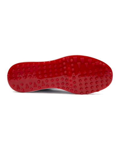 Straight Down Defender Golf Shoe in Camo Ocean, bottom sole view featuring solid red mixed traction outsole with hexagonal and triangular lugs, white midsole edge, and white arch bridge