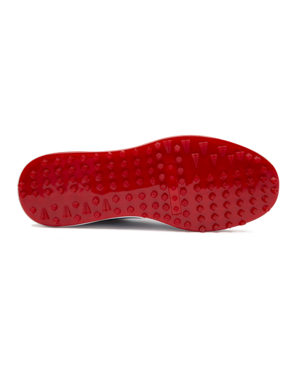 Straight Down Defender Golf Shoe in Camo Ocean, bottom sole view featuring solid red mixed traction outsole with hexagonal and triangular lugs, white midsole edge, and white arch bridge