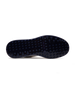Straight Down Defender Golf Shoe in Camo Stone, bottom sole view featuring navy mixed traction outsole with hexagonal and triangular lugs and white midsole edge