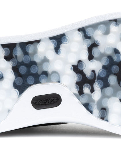 Field V3 Shoes in Black, close-up outsole detail view featuring a black and white camo-patterned rubber traction sole with circular grip nubs and black Straight Down logo detail on the white heel