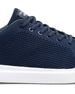 Navy blue sneaker with white sole on a white background