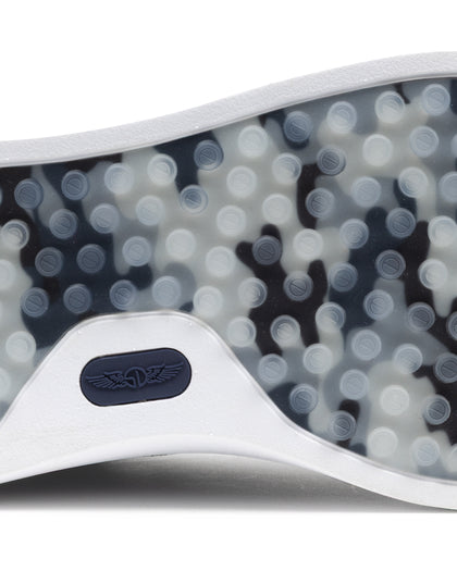 Field V3 Shoes in New Indigo, close-up outsole detail view featuring a navy and gray camo-patterned rubber traction sole with circular grip nubs and navy Straight Down logo detail on the heel