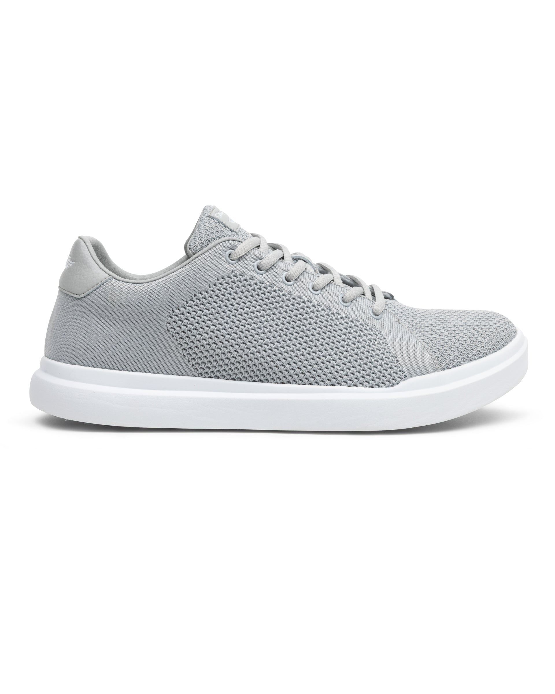 Gray sneaker with white sole on a white background