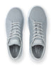 Pair of gray sneakers with a brand logo on a white background