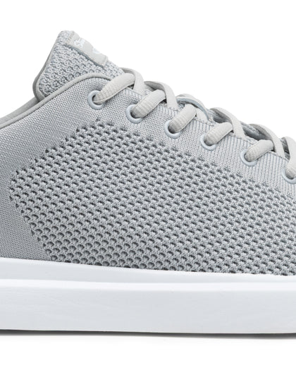 Field V3 Shoes in Silver, close-up side view featuring a light gray knit mesh upper with textured woven pattern, gray lace-up closure, and white midsole