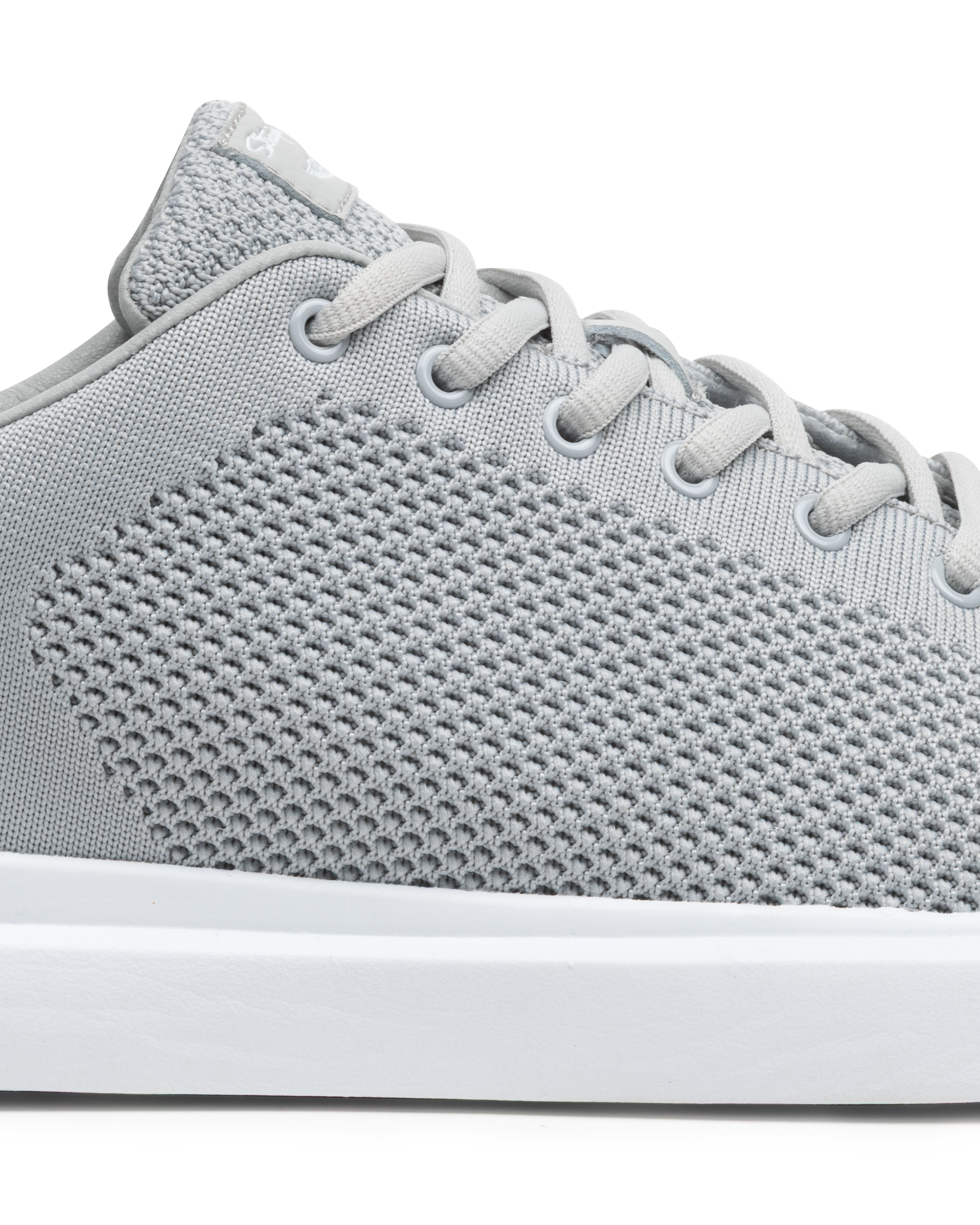 Field V3 Shoes in Silver, close-up side view featuring a light gray knit mesh upper with textured woven pattern, gray lace-up closure, and white midsole