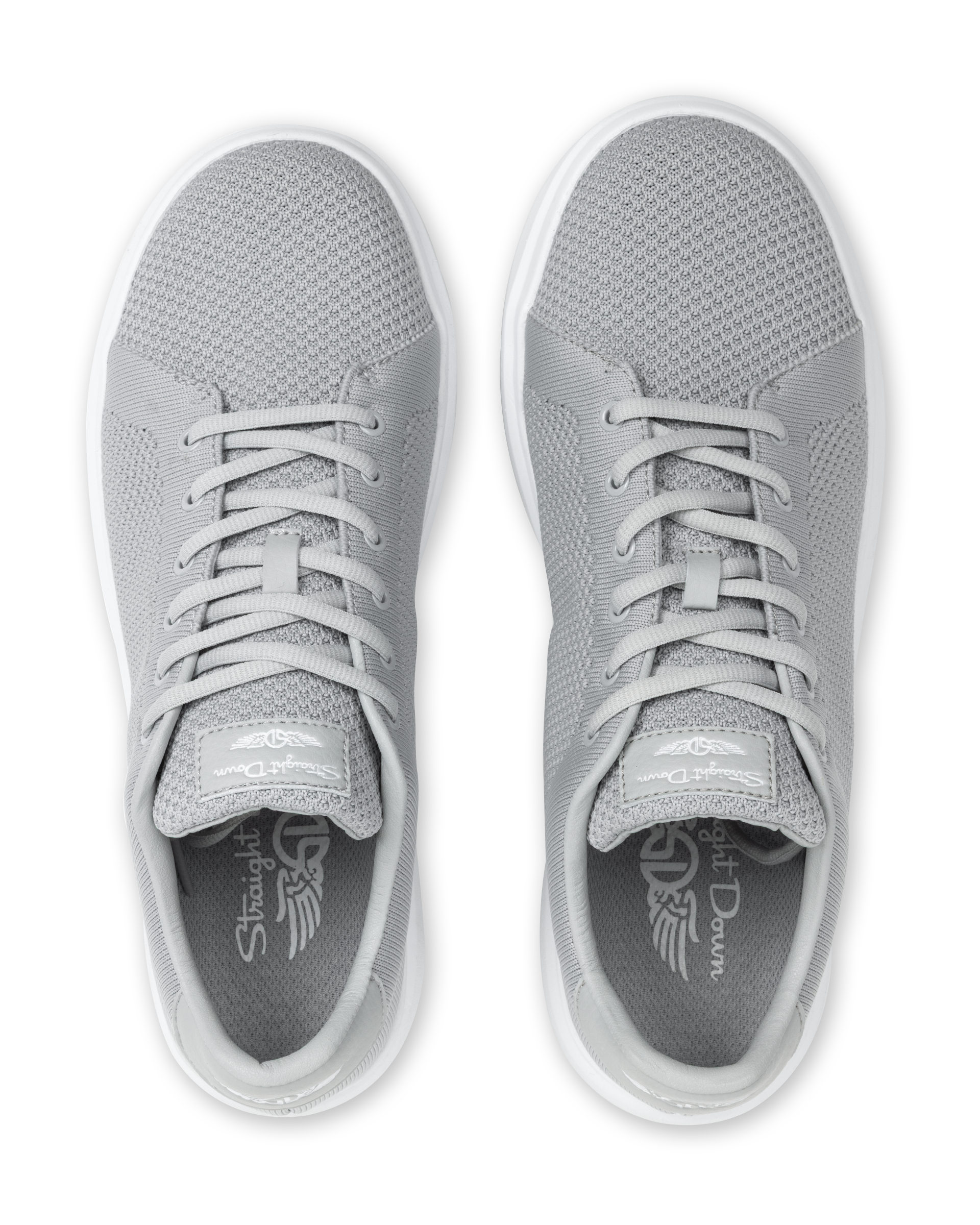 Pair of silver sneakers with a brand logo on a white background