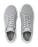 Pair of silver sneakers with a brand logo on a white background