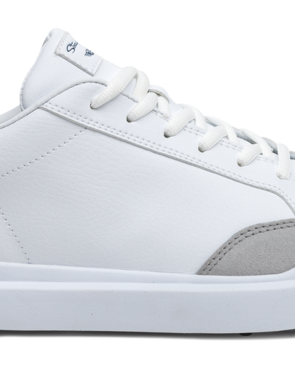 Cruise Shoes in White, close-up side view featuring a white leather upper with light gray suede heel accent, white lace-up closure, and Straight Down logo tongue tab detail on a white midsole