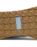 Clubhouse Trainer with white body, red and blue accents, tread detail view