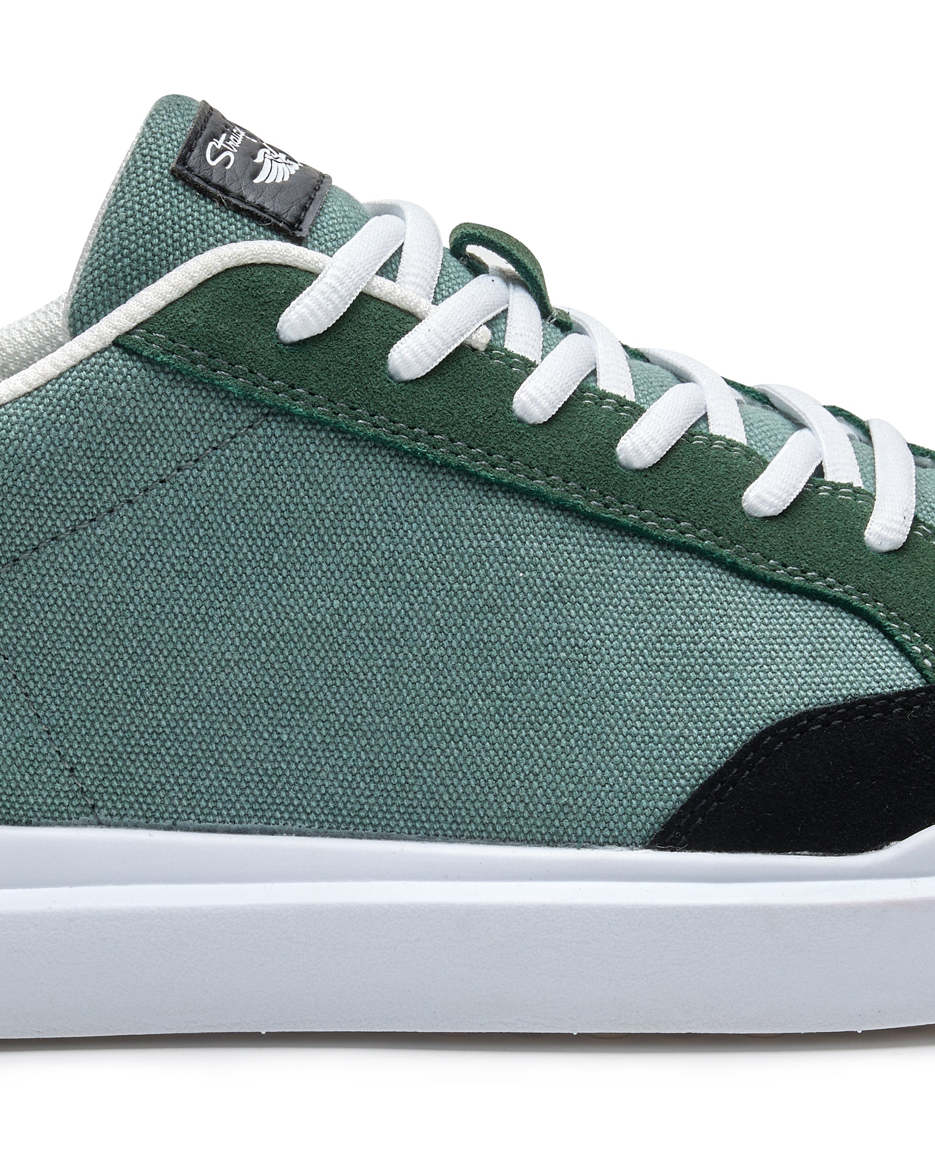 Cruise Canvas Sneaker in Dark Forest Green, side detail view