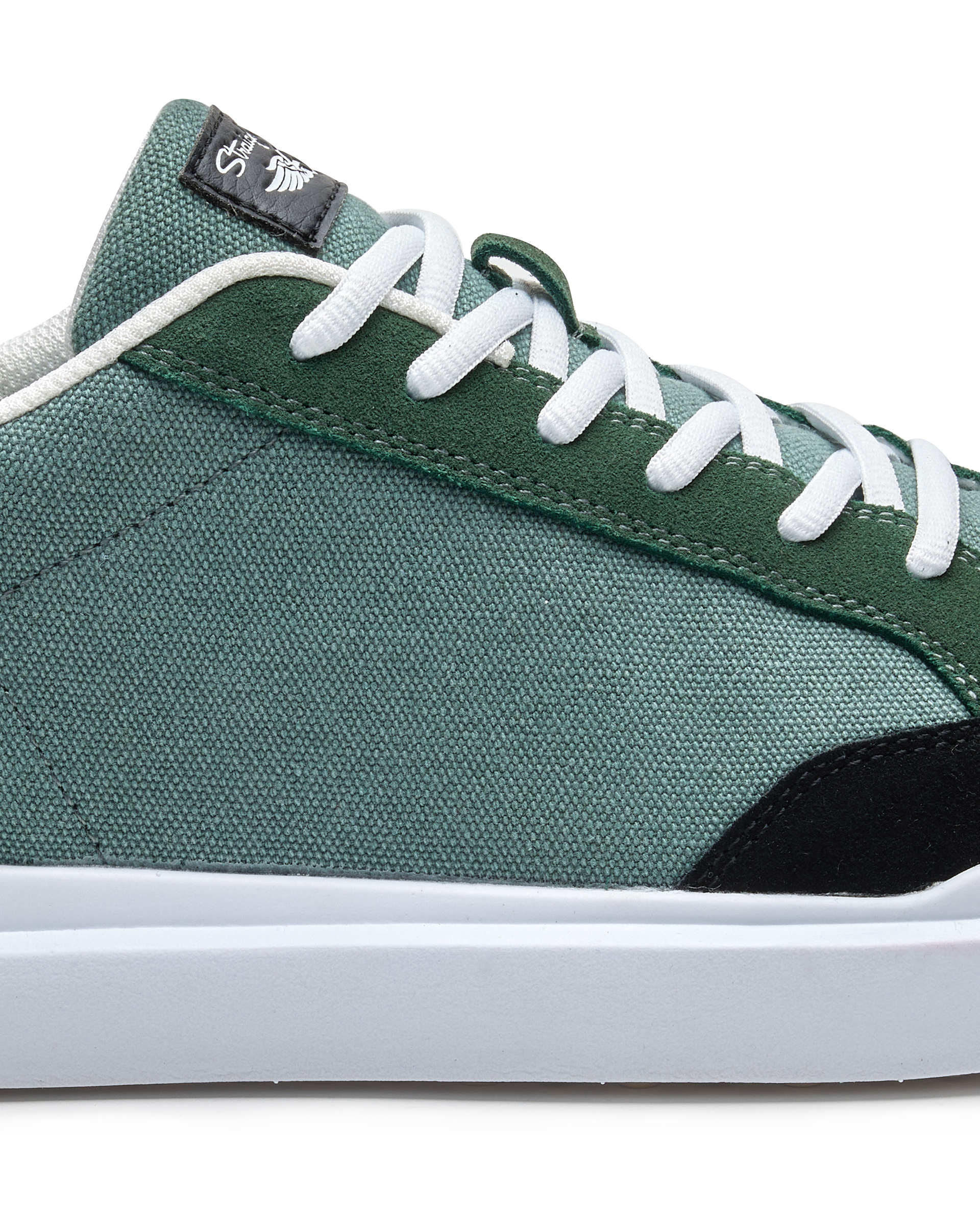 Cruise Canvas Sneaker in Dark Forest Green, side detail view
