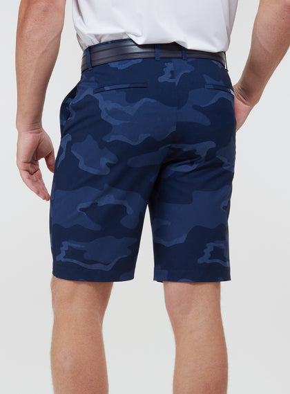 Straight Down Men's Pendleton Short in New Indigo, on model back view showing navy blue camo print with back welt pockets and navy leather belt