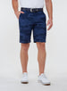 Straight Down Men's Pendleton Short in New Indigo, on model front view showing navy blue camo print paired with a white polo, navy leather belt, and white golf shoes