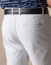 Men's Maverick Twill Short in Silver, detail close-up back view featuring a light gray solid twill fabric with a welt back pocket and tonal logo embroidery, styled with a black belt