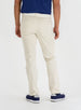 Men's Clemson Pant in Stone, on-model back view featuring a light tan five-pocket style with two rear welt pockets worn with a navy polo and navy golf shoes