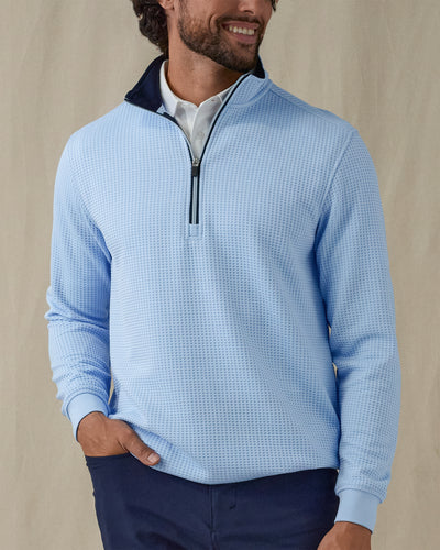 Men’s Optic quarter zip in carolina blue with navy contrast collar, model front view