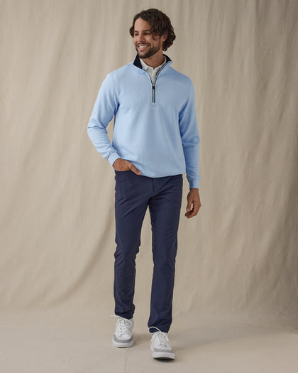 Men’s Optic quarter zip in carolina blue with navy contrast collar, full outfit styled with navy pants