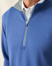 Close-up of Men’s Optic Quarter-Zip in moonlight blue showing textured waffle-knit fabric and quarter-zip collar