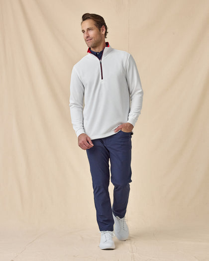 Men’s Optic Quarter Zip in White / Flag Red / New Indigo, styled full outfit view with navy pants