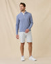 Full-length view of model wearing the Crusher Quarter Zip in Moonlight with light shorts and white sneakers.
Image 5: Close-up o
