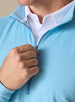 Men's Ballard Quarter Zip in Niagara, on model close-up view of the quarter zip detail layered over a white polo