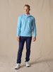 Men's Ballard Quarter Zip in Niagara, on model front view full length styled over a white polo with navy pants and white golf shoes