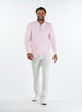 
Men's Ballard Quarter Zip Pullover with Soft Pink Base, full-body model view with white pants 