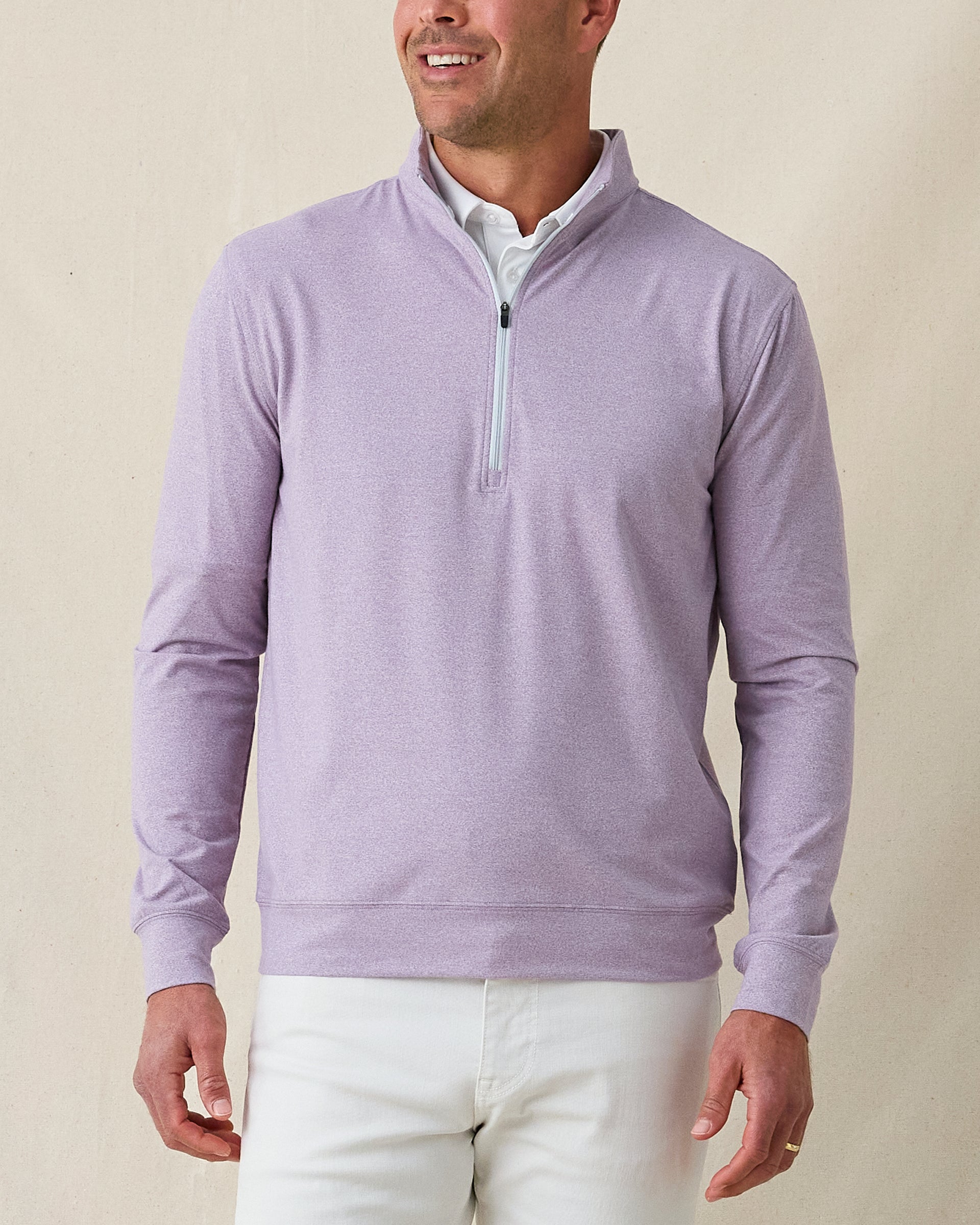 Man wearing Ballard Quarter-Zip in mulberry, front view styled with light pants