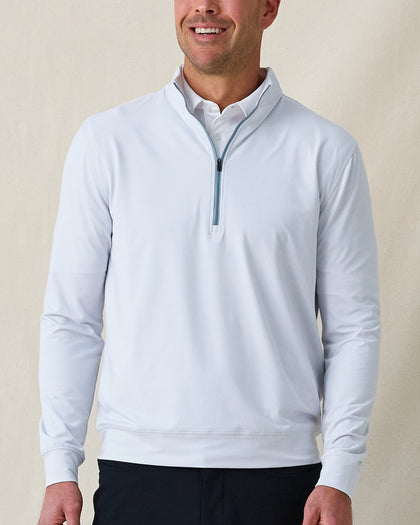 Man wearing Ballard Quarter-Zip in silver, front view styled with dark pants
