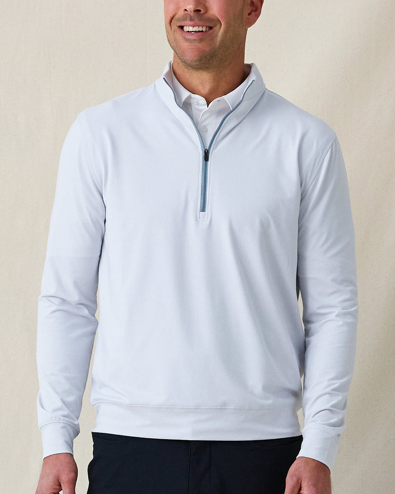 Man wearing Ballard Quarter-Zip in silver, front view styled with dark pants