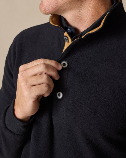 Men's Foothill V2 Placket in Black, close-up front detail view featuring black fleece fabric, three-button placket with gold suede inner placket trim and engraved Straight Down buttons