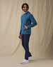 MacKenzie Hoodie in Petrol Camouflage Blue, side model view styled with navy pants