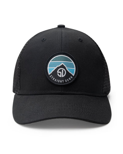 Night Landscape Hat in Black, front view featuring a black structured trucker cap with mesh back panels and a circular Straight Down logo patch with mountain and blue stripe design centered on the front panel
