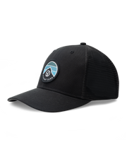 Night Landscape Hat in Black, angled side view featuring a black structured trucker cap with mesh back panels and a circular Straight Down logo patch with mountain and blue stripe design on the front panel