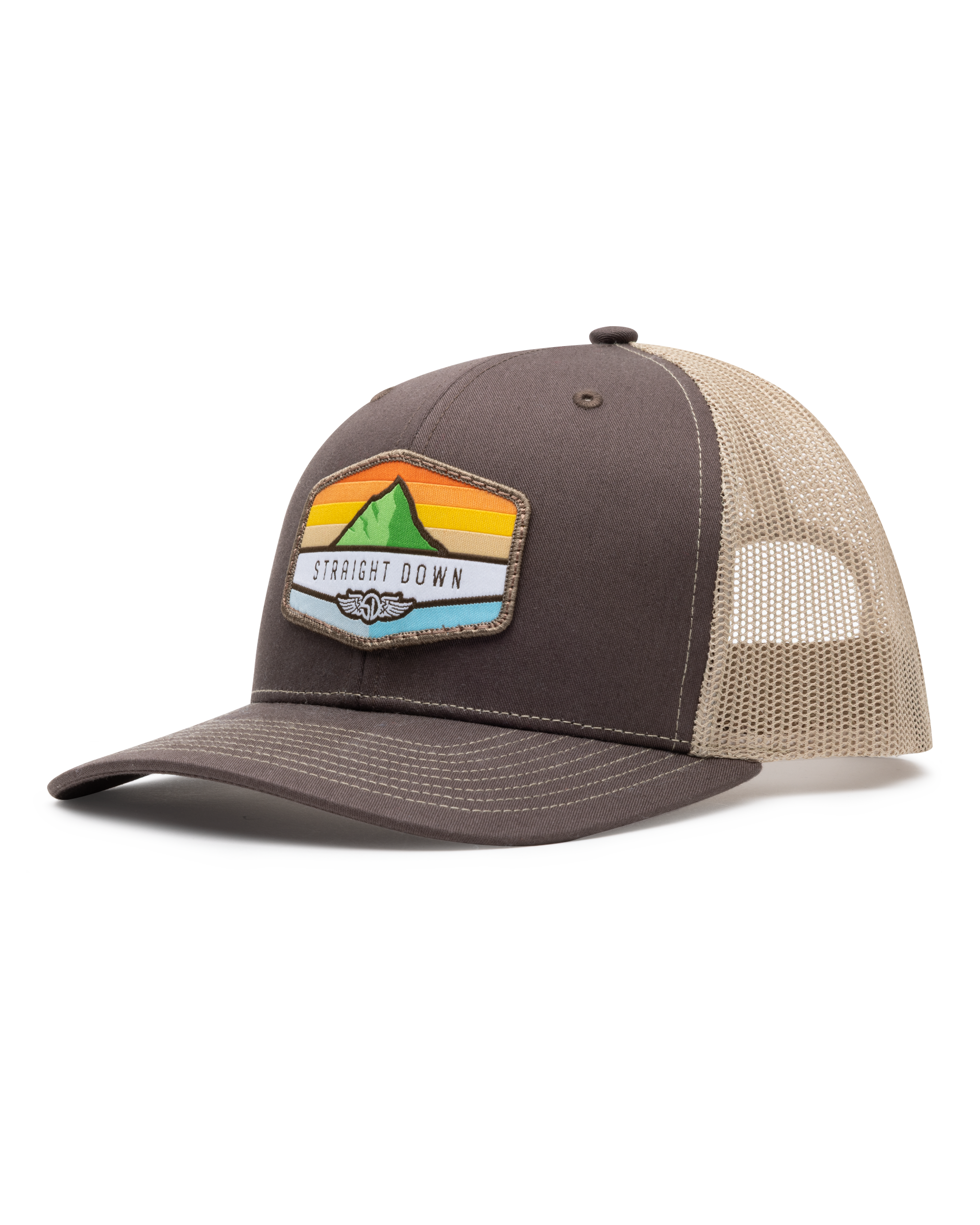 El Toro Hat in Brown, side view featuring a brown structured trucker cap with a woven mountain sunset landscape patch and Straight Down logo on the front panel, with tan mesh back panels and tan contrast stitching on the brim