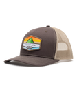 El Toro Hat in Brown, side view featuring a brown structured trucker cap with a woven mountain sunset landscape patch and Straight Down logo on the front panel, with tan mesh back panels and tan contrast stitching on the brim