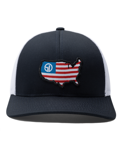 Front view of the United Hat in Navy/White with an embroidered USA flag map patch and Straight Down logo on the navy crown.
