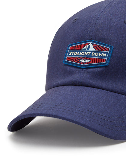 Straight Down SD Mountain Hat in Navy, close-up view showing red, white, and blue Straight Down mountain patch detail on navy front panel