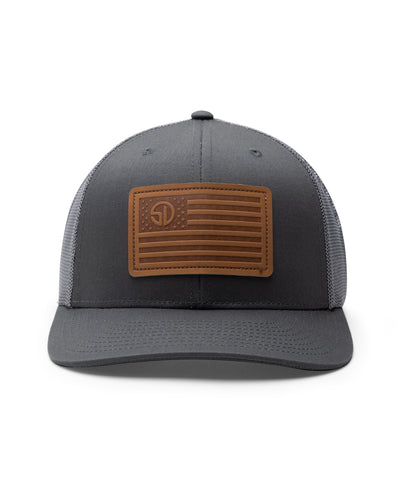 Straight Down SD Flag Hat in Charcoal, front view showing charcoal structured front panel with grey mesh sides and brown leather American flag patch with Straight Down logo