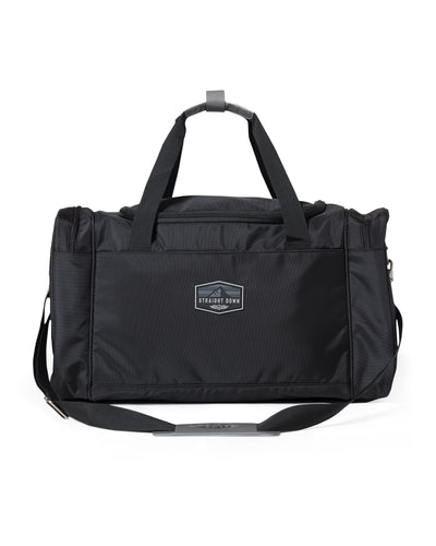 Straight Down Montana Duffle Bag in Black, front view featuring a black nylon duffle bag with a Straight Down mountain badge logo patch, top zip closure, dual carry handles, front zip pocket, and adjustable black crossbody strap
